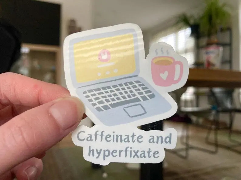 Caffeinate and hyperfixate ADHD sticker with laptop and coffee cup, handmade by Neurodiversetea