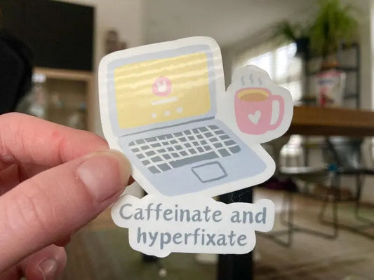 Caffeinate and hyperfixate ADHD sticker with laptop and coffee cup, handmade by Neurodiversetea