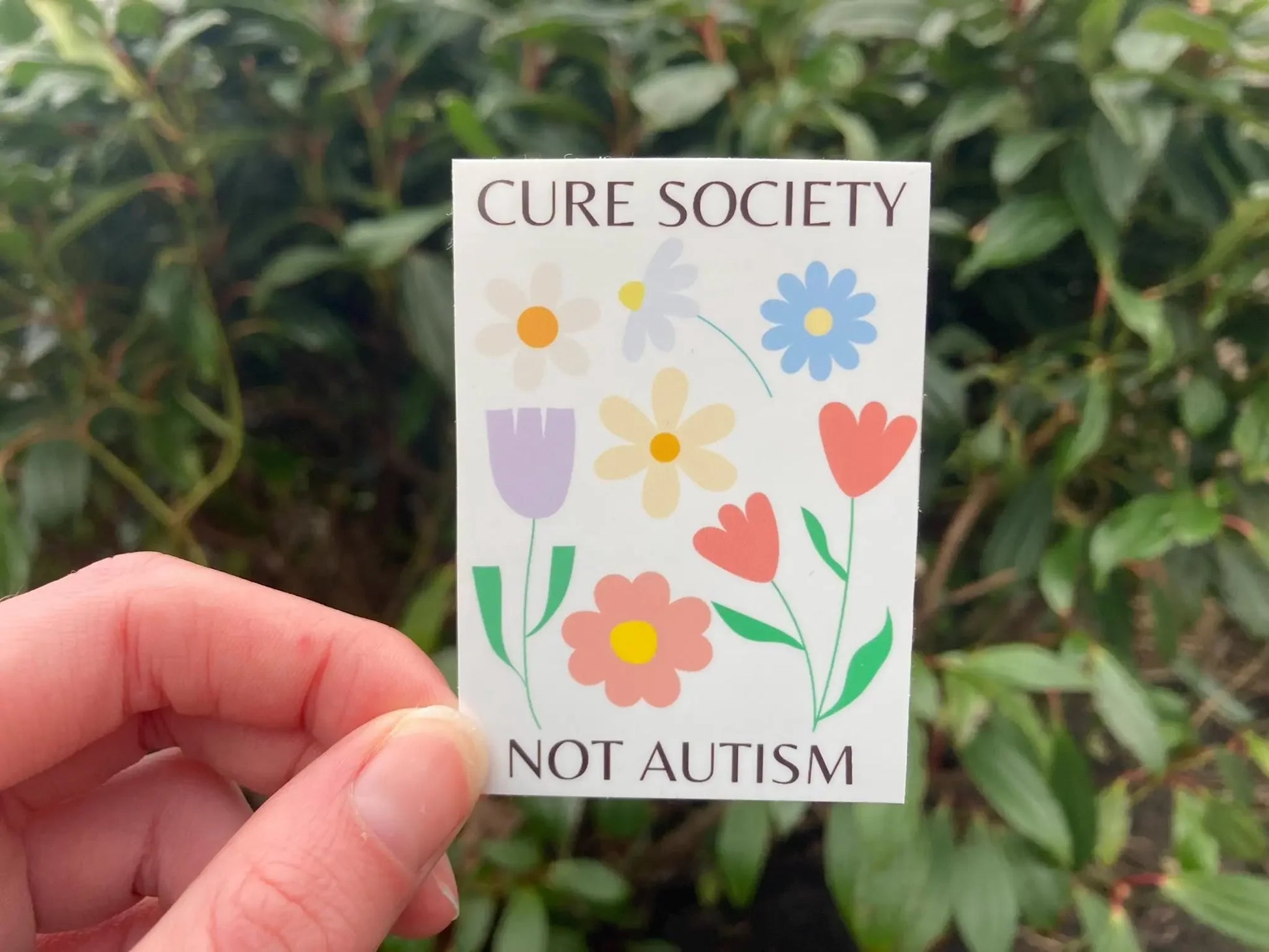"Cure society not autism" flower sticker - handmade by Neurodiversetea