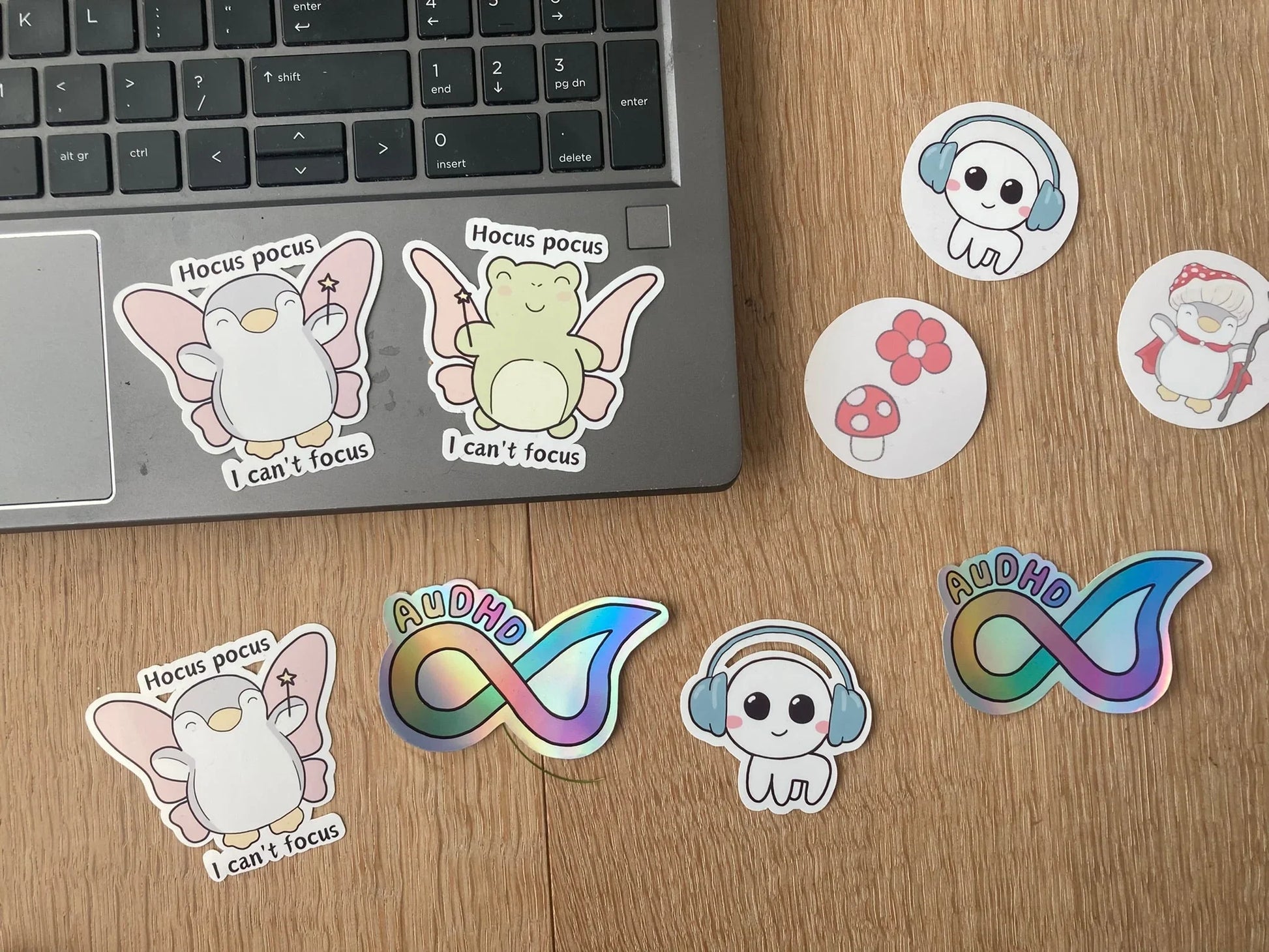 Relatable ADHD frog and penguin sticker "Hocus pocus, I can't focus" shown as laptop sticker, handmade Neurodiversetea