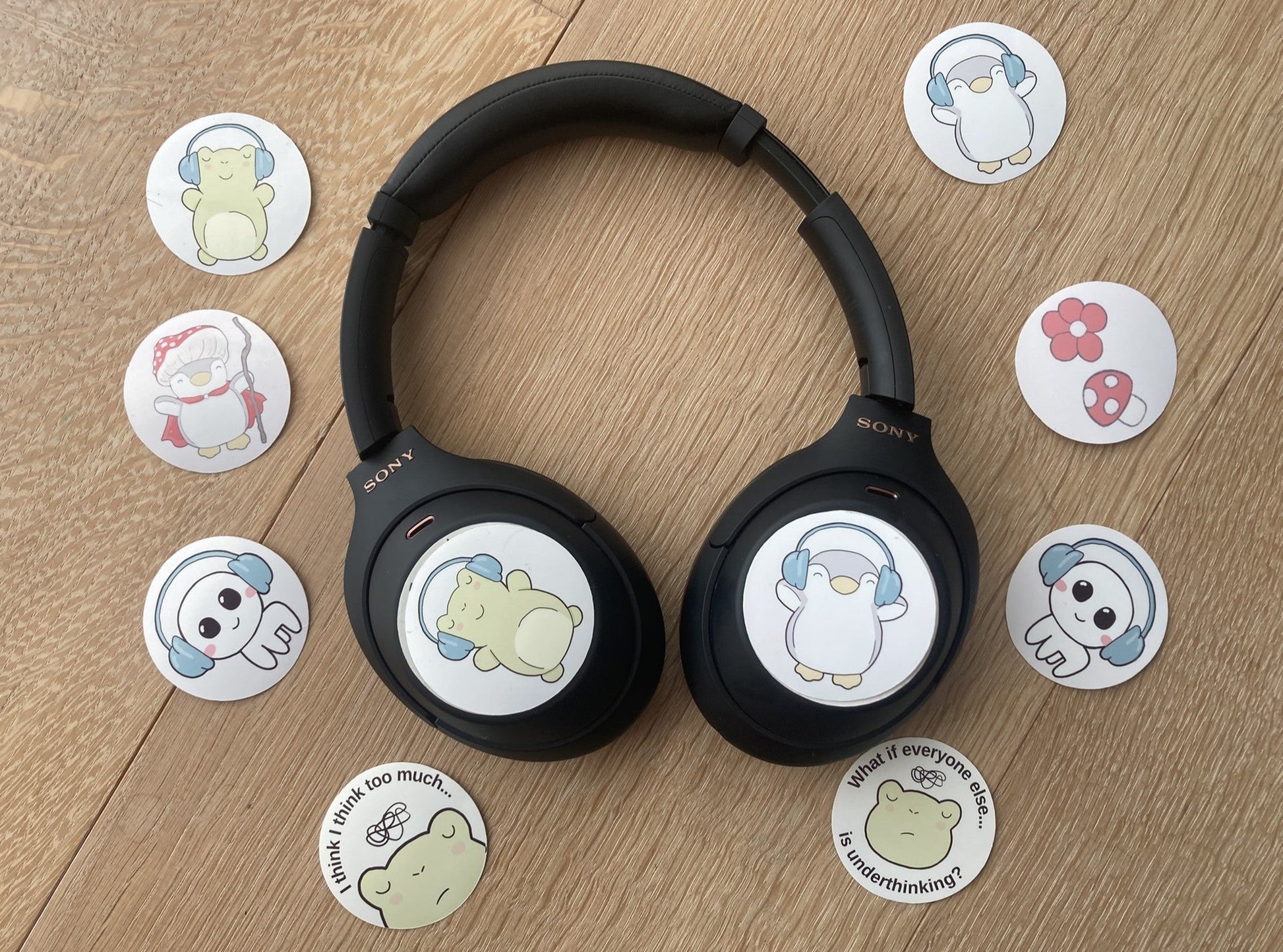 Headphone sticker set: cute penguin and frog set shown, handmade by NeurodiverseTea
