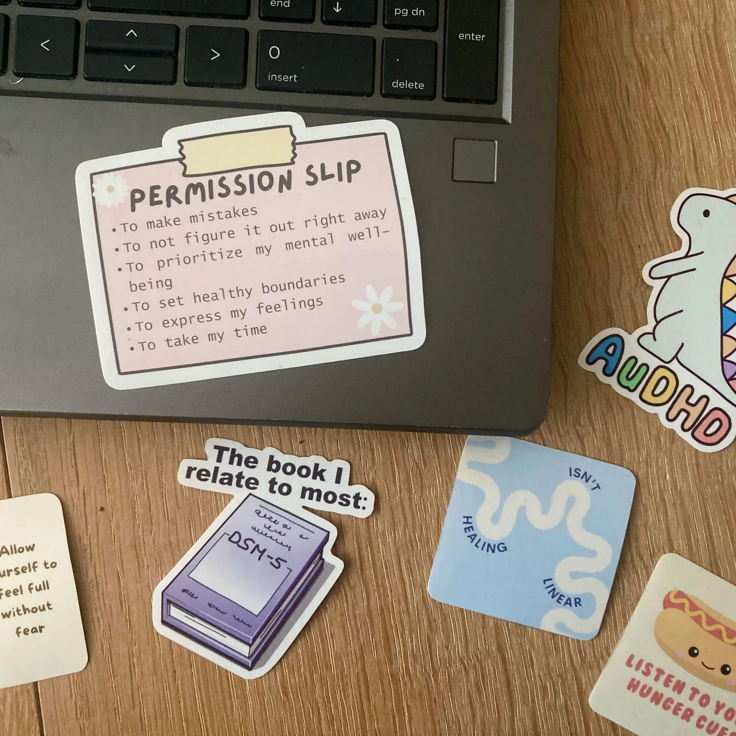 Mental health permission slip sticker shown as laptop sticker, handmade by Neurodiversetea