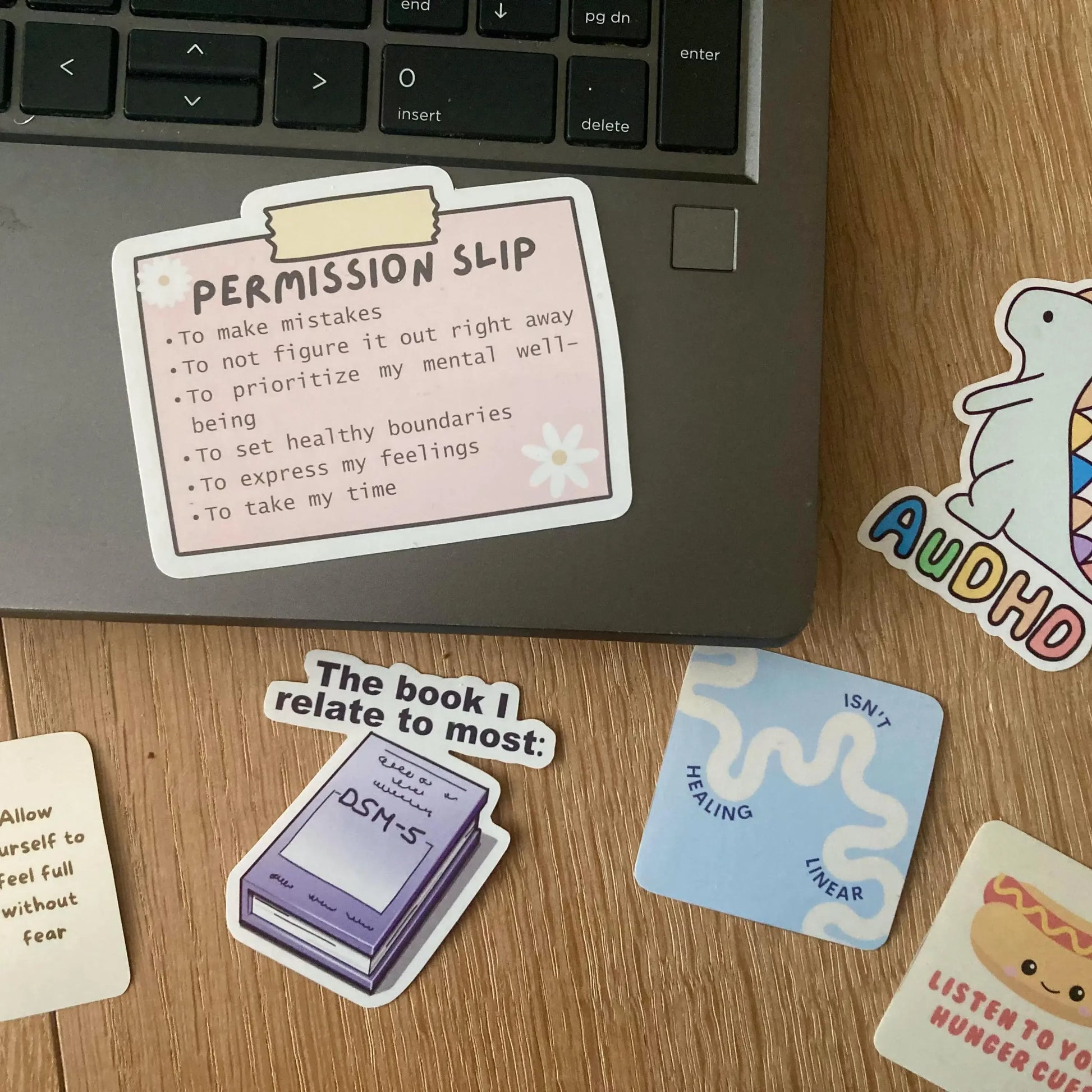 Mental health permission slip sticker shown as laptop sticker, handmade by Neurodiversetea
