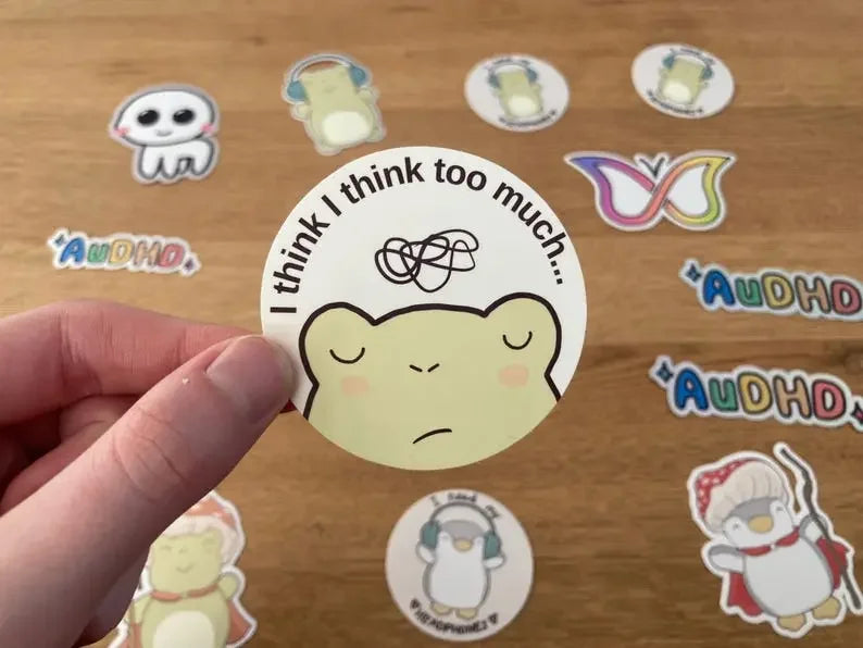 Cute frog overthinker sticker with the text "I think I think too much", handmade by Neurodiversetea