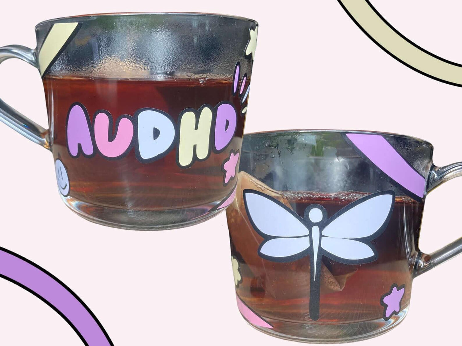One of the neurodiversity mugs shown: the AuDHD (autism and ADHD) glass mug