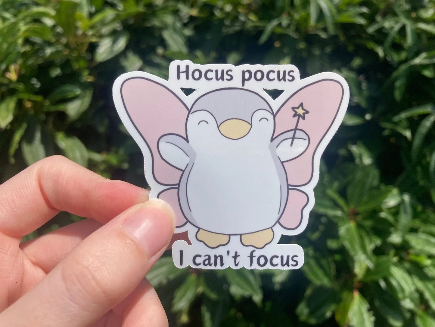 Fairy penguin ADHD sticker with the text "Hocus pocus, I can't focus", handmade by  Neurodiversetea