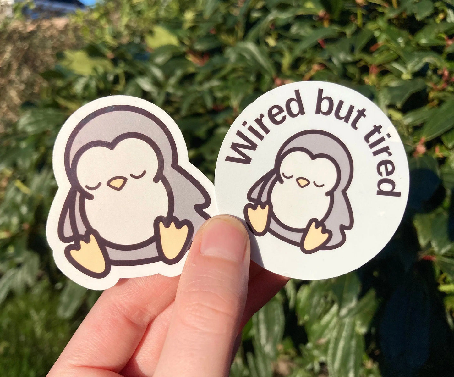 "Wired but tired" sleepy penguin sticker, handmade by NeurodiversTea (small business) 